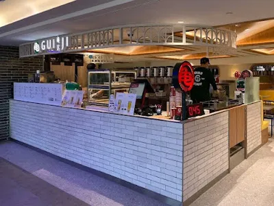 龜記茗品-桃園機場第一航廈 B4 登機門 店面照
